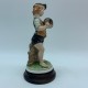 Figurine en porcelaine Galos musicien enfant gavroche joueur de cymbale