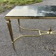 Table basse pietement en bronze doré etn plateau en marbre vert style Jansen Charles