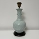 Pied de lampe style asiatique en porcelain céladon sans abat jour.