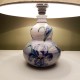 Lampe en céramique a décor floral composé d'orchidées La roue Vallauris