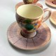 Lot de 7 tasses en céramique avec soucoupes M. C. Treinen