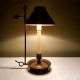 Petite lampe de bureau dite bouillote de style empire avec abat jour en fer