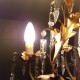 Lustre 4 feux italien en métal doré décoré de pampilles en cristal
