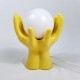Lampe 2 mains tenant un globe en céramique jaune vintage années 70