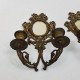 Paire d'appliques chandeliers miroir en bronze décor de chérubins