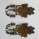 Paire d'appliques chandeliers miroir en bronze décor de chérubins