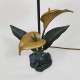 Lampe en bronze a décor de fleur d'arum