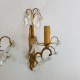 Paire d’appliques en bronze doré à pampilles de cristal