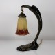 Lampe aigle bronze patiné et pate de verre de style Art Nouveau