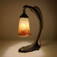 Lampe aigle bronze patiné et pate de verre de style Art Nouveau