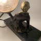 Lampe femme tenant un globe en verre Sujet en régule Art Deco