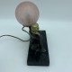 Lampe femme tenant un globe en verre Sujet en régule Art Deco