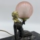 Lampe femme tenant un globe en verre Sujet en régule Art Deco